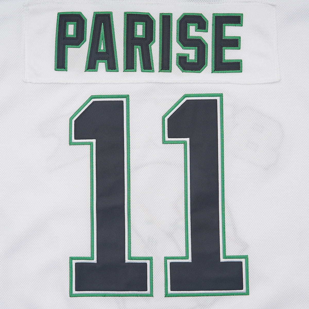 Dakota Sioux Ice #11 Hockey Jersey — White — lettering detail