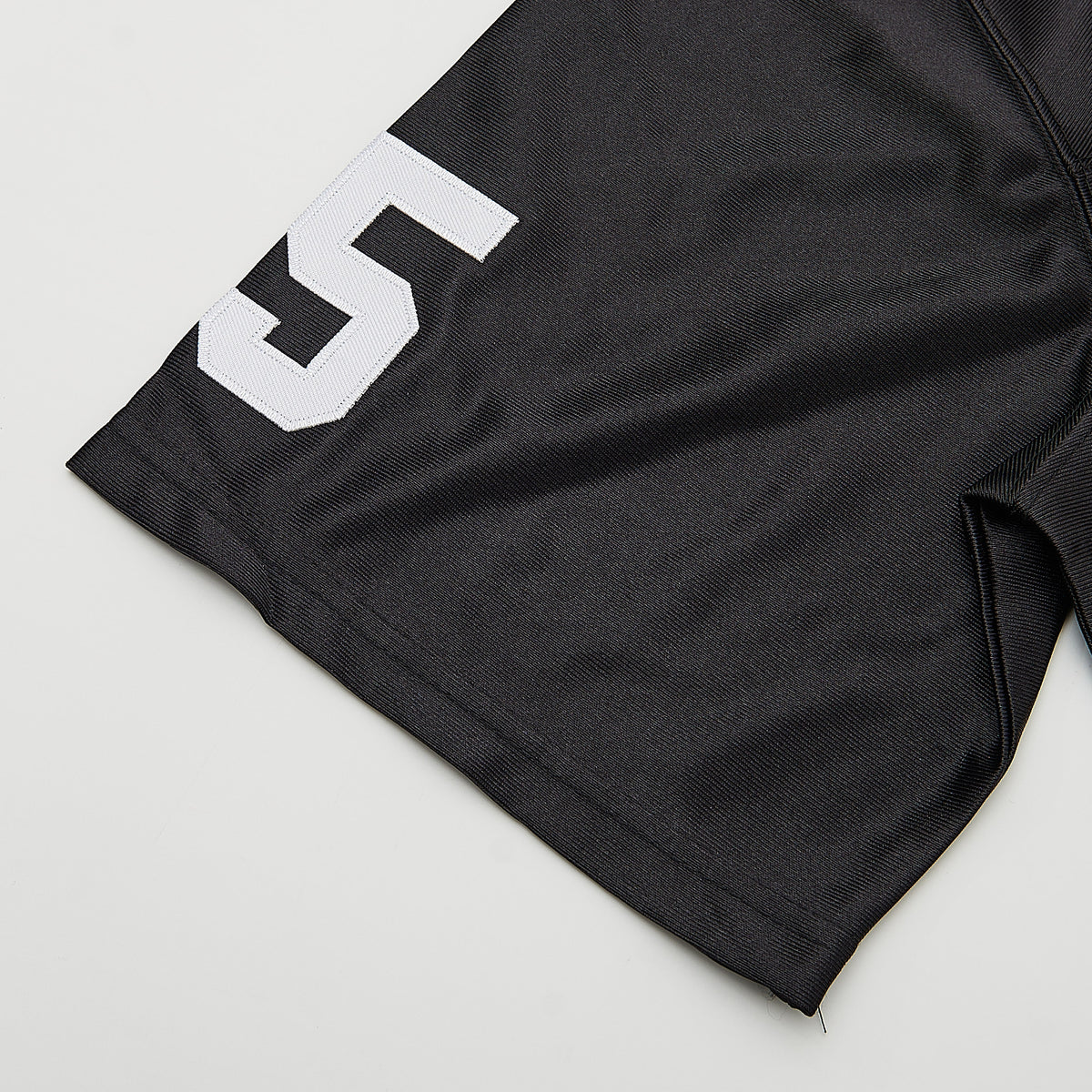 Boobie Miles Permian #45 High Friday Night Lights Football Jersey — Black — hem detail