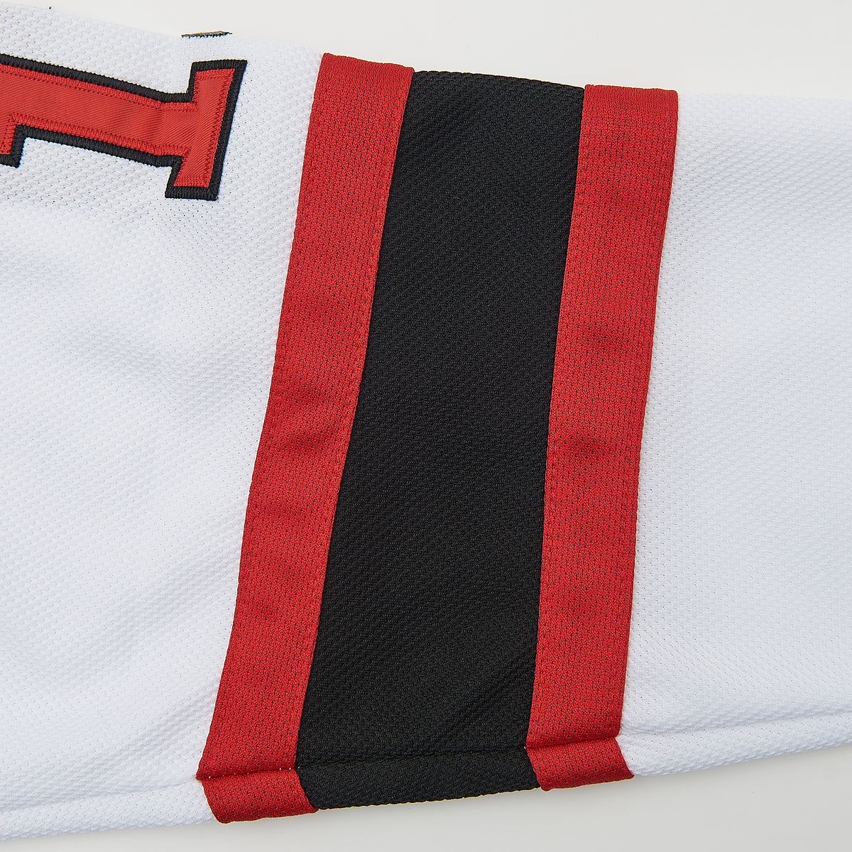 Friday The 13th Jason Voorhees Hockey Jersey — hem detail