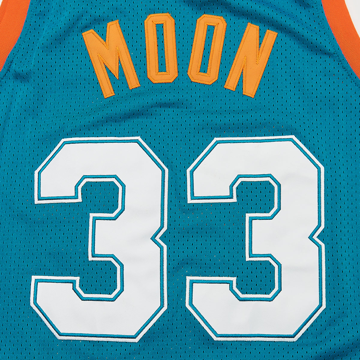 Jackie Moon #33 Semi-Pro Flint Tropics Basketball Jersey — Blue — lettering detail