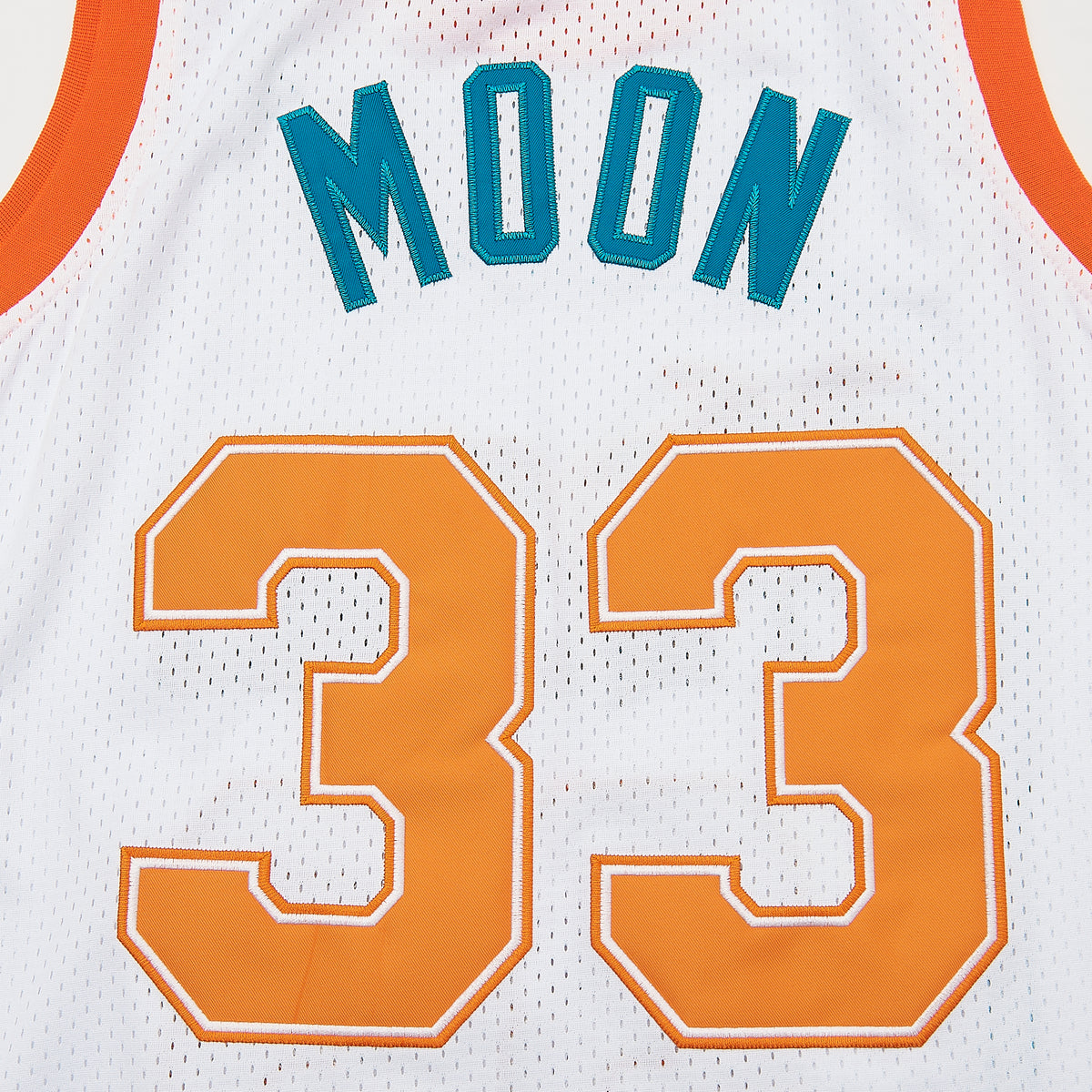 Jackie Moon #33 Semi-Pro Flint Tropics Basketball Jersey — White — lettering detail
