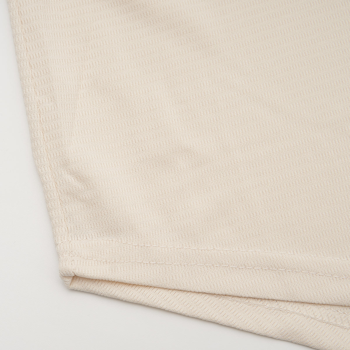Jimmy Dugan Rockford Peaches #43 Baseball Jersey — hem detail