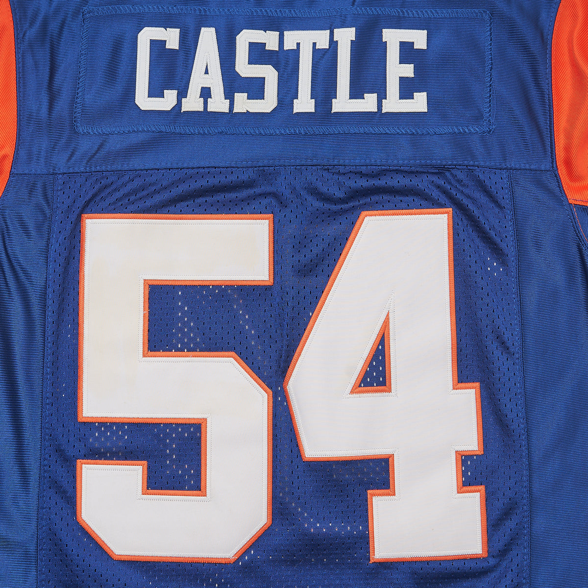 Thad Castle Blue Mountain State #54 Football Jersey — Blue — lettering detail