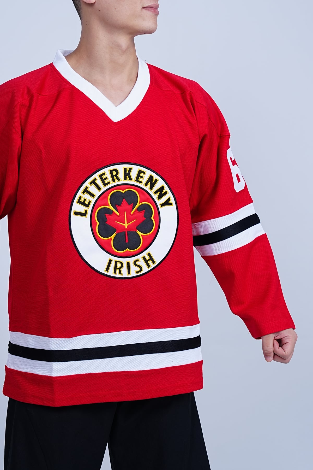 Shoresy Summer Christmas #69 Letterkenny Irish Hockey, red jersey front detail worn on a model