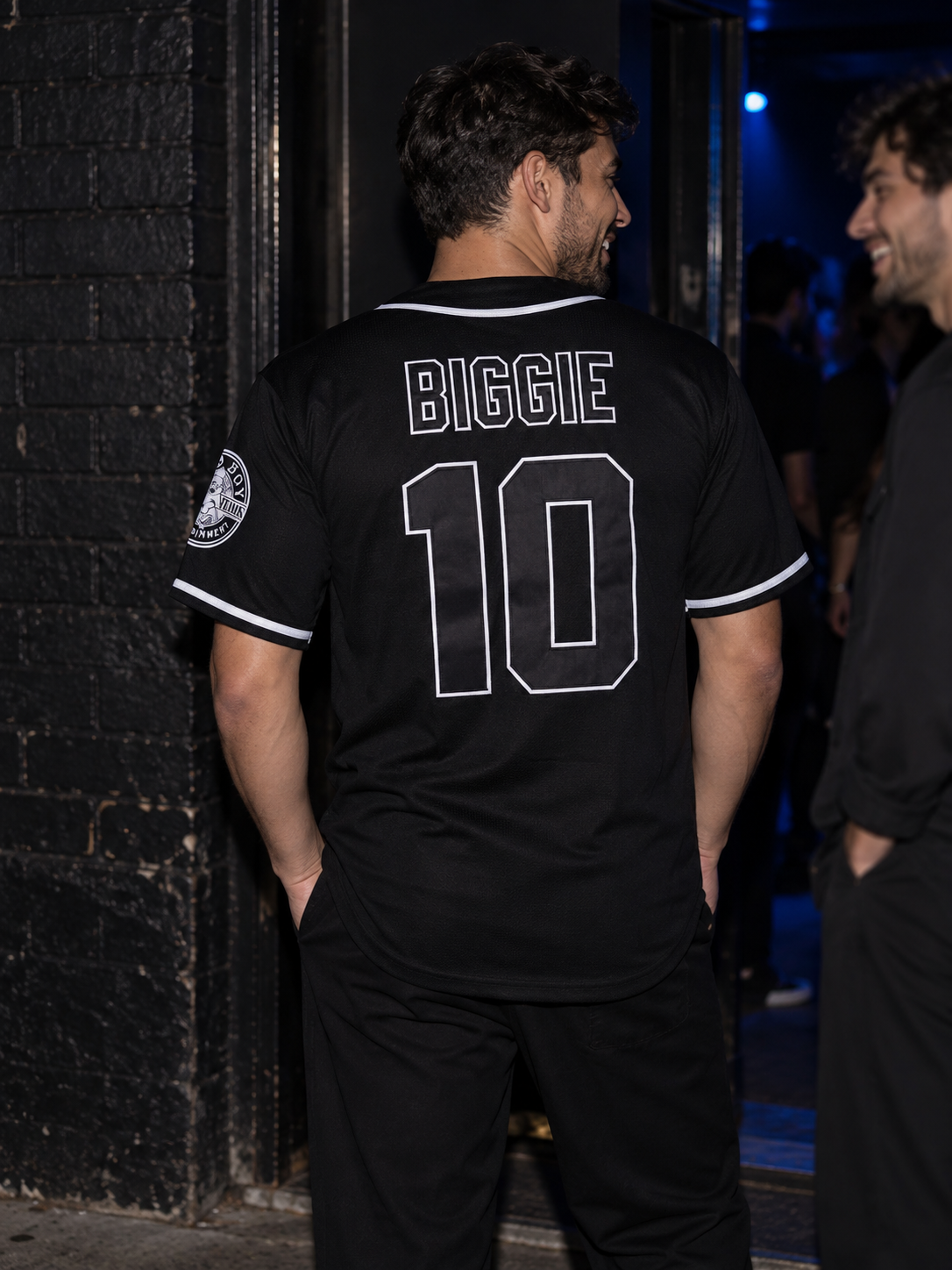 Biggie black baseball jersey worn to a night out with friends